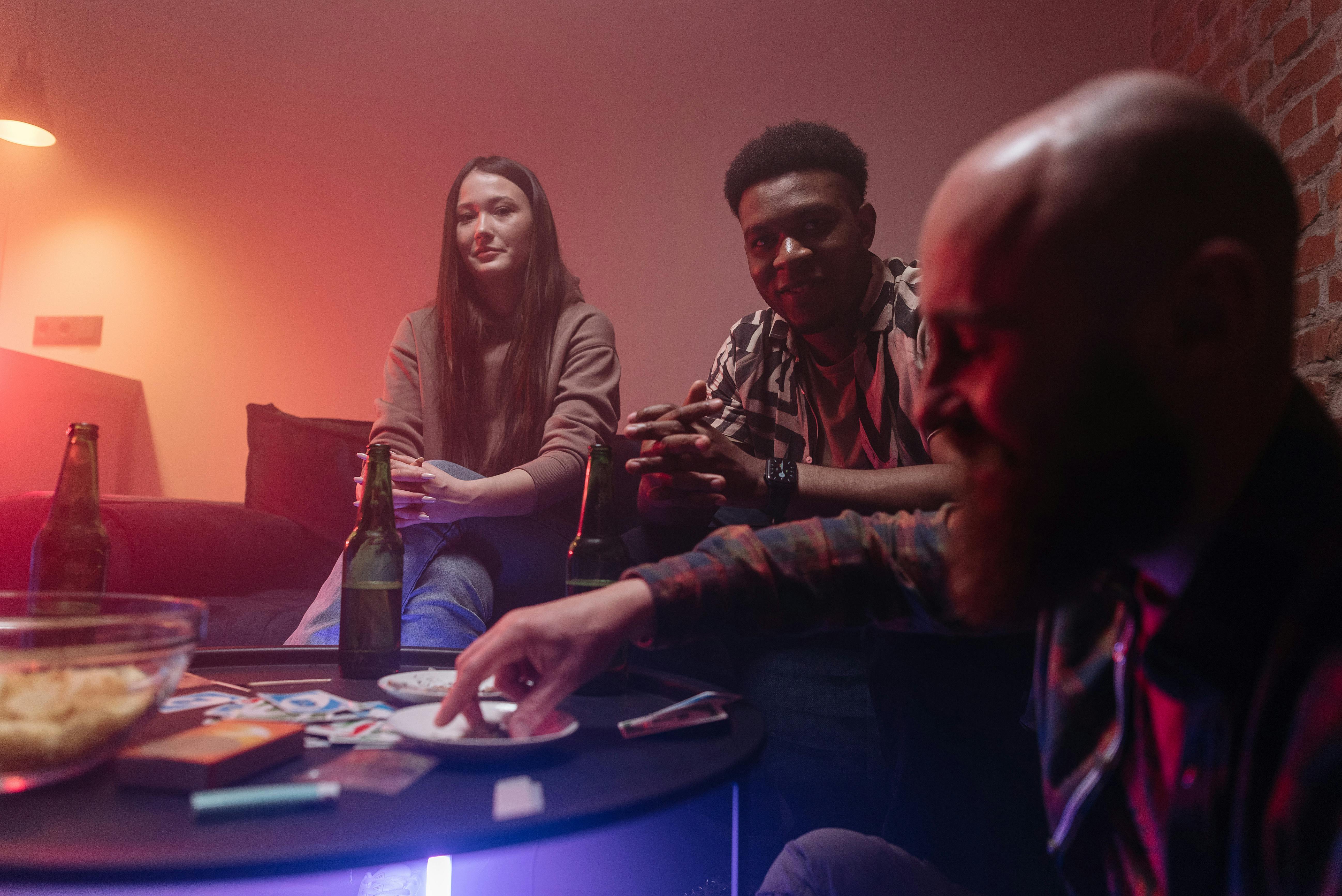 Decorated private party room with themed lighting, tables, and balloons